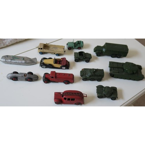 121 - Dinky Toys; Tinplate models and Tin soldiers, early plastics models