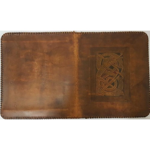 65 - Leather hand stiched folder. With Celtic design engraved on the front. Exquisite.