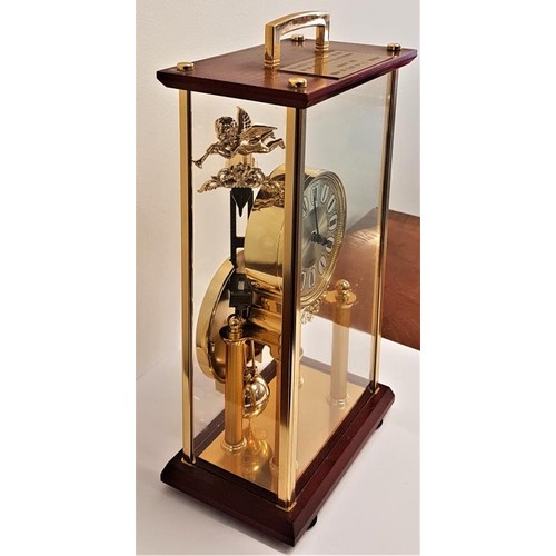 25 - Seiko Brass and Glass Case Mantle Clock, c.16in tall, with engraved plate