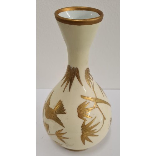 147 - Japanese Bud Vase profusely decorated with gold birds among trees and all on a pale yellow ground. c... 