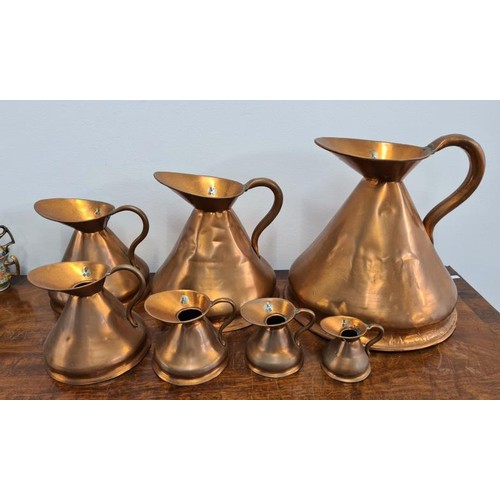 152 - Set of Seven Antique Graduated Copper Jug Measures - 1 gallon to 1/2 gill