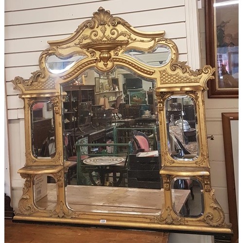 118 - Exceptional 19th Century Carved and Gilded Seven Panel Overmantle Mirror, profusely decorated with s... 