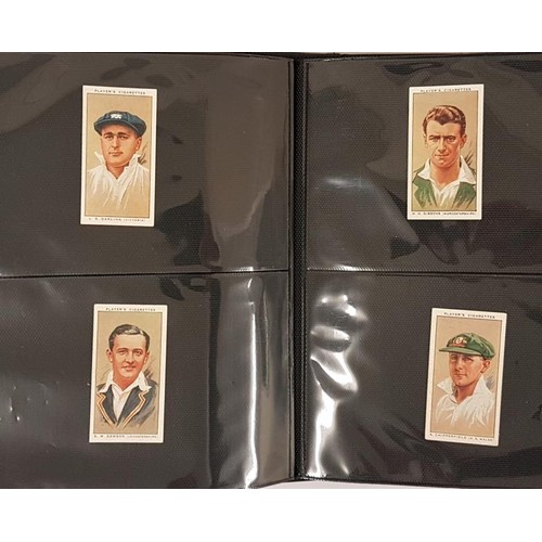 66 - Photo album C. 1950 of cigarette cards of jockeys, soccer players and cricket players. About 150 car... 