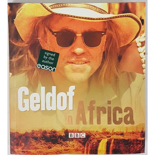 105 - Geldof in Africa - Bob Geldof. First Edition, first printing SIGNED by Bob Geldof to the title page.... 
