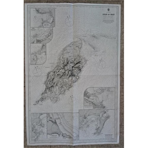 61 - Very large map of The Isle of Man. Size 68 X 100cms including 7 small maps of Isle of Man harbours, ... 