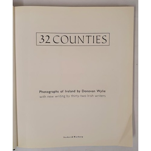 436 - Donovan Wylie; 32 Counties with new writing by 32 Irish writers, first edition HB signed at their co... 