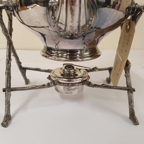 152 - A beautiful, silver-plated Spirit Kettle, on a stand, providing a tilting movement, complete with bu... 