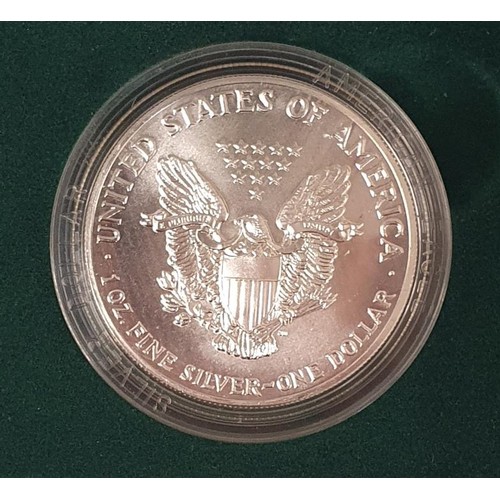 192 - 1989 American Eagle Silver Dollar, in original box and with certificate of authenticity. 1 troy ounc... 