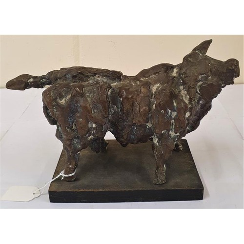 John Behan RHA, b.1938, Bronze Bull, signed John Behan & dated 1975. On a simple softwood base. Total weight c.4.6KG. Measures c.29cm long, c.18.5cm tall (incl. base). With original Exhibition Catalogue of John Behan's Work at the Kenny Art Gallery in September 1975 and John Behan Poet of Sculpture, with Text by Hayden Murphy, 1970.