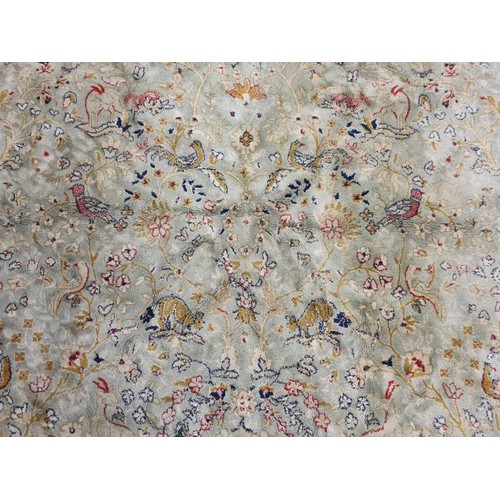 285 - Good Large Floor Rug decorated with an array of animals and floral panels on a cream ground and with... 