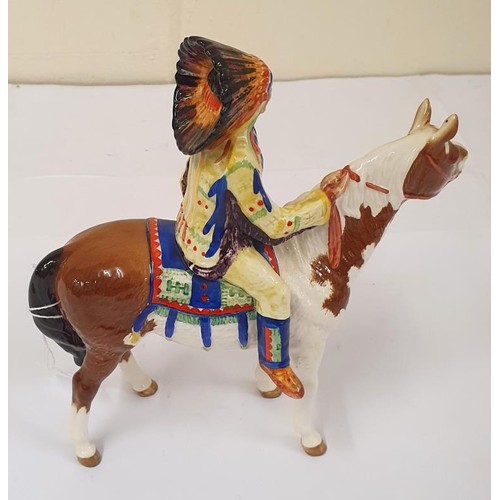 304 - Beswick Indian Chief On Horseback. The chief dressed in typical native American dress and regalia, m... 