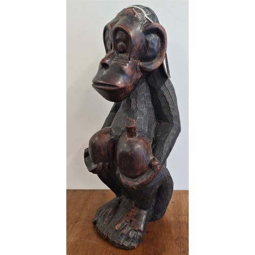 390 - Carved African Hardwood Figure of a Seated Monkey - 15ins tall