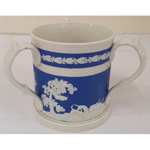 419 - Copeland Spode Three Handle Loving Cup, with jasperware decoration and three hunting scene panels, l... 