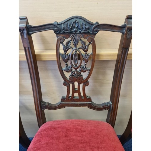 446 - Set of Four Edwardian Mahogany Dining Chairs with carved and pierced seat back and over-stuffed seat... 