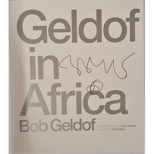 612 - Geldof in Africa - Bob Geldof. First Edition, first printing SIGNED by Bob Geldof to the title page.... 