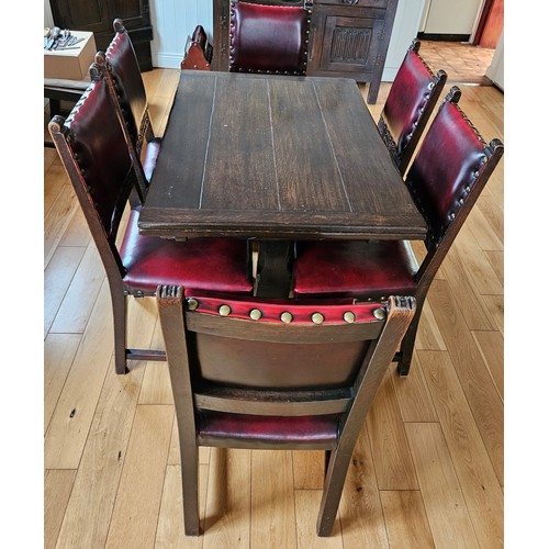 266 - Vintage Oak Dining Room Suite, comprising extending dining table and a set of 6 carved and leather u... 