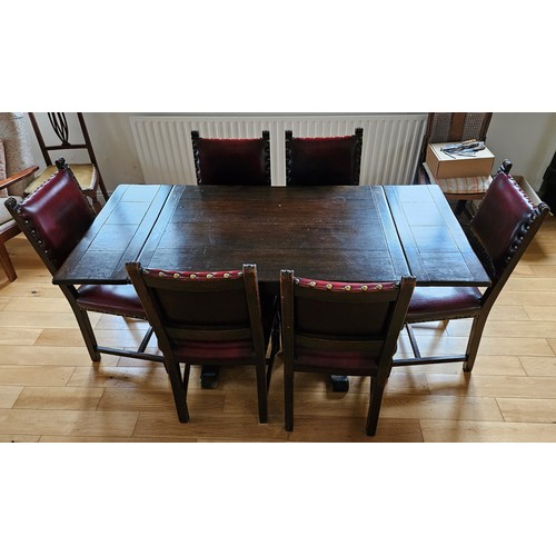 266 - Vintage Oak Dining Room Suite, comprising extending dining table and a set of 6 carved and leather u... 