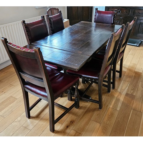 266 - Vintage Oak Dining Room Suite, comprising extending dining table and a set of 6 carved and leather u... 