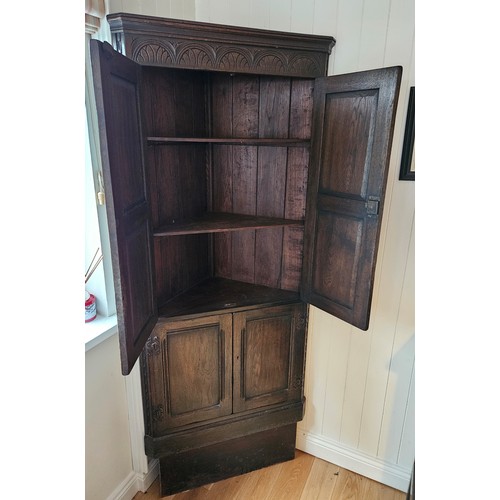 269 - Vintage Oak Sideboard and matching corner cupboard. The sideboard with low gallery above a pair of d... 