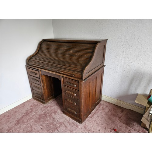 274 - Edwardian Oak Roll Top Desk, with the tambour front enclosing and arrangement of drawers and pigeon ... 