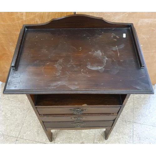 286 - Edwardian Mahogany Music Cabinet, the three quarter gallery over an open shelf above three fall fron... 