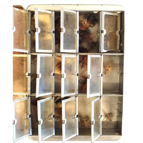 211 - An Allcock Tin Fly Box with nine compartments, with flies. c.5in wide, 3.5in deep and 1in tall