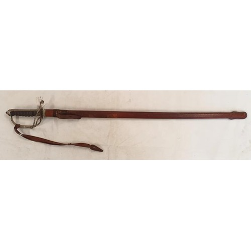 264 - 1821 Light Cavalry Officer Sword. Good etching on blade in a leather Scabbard