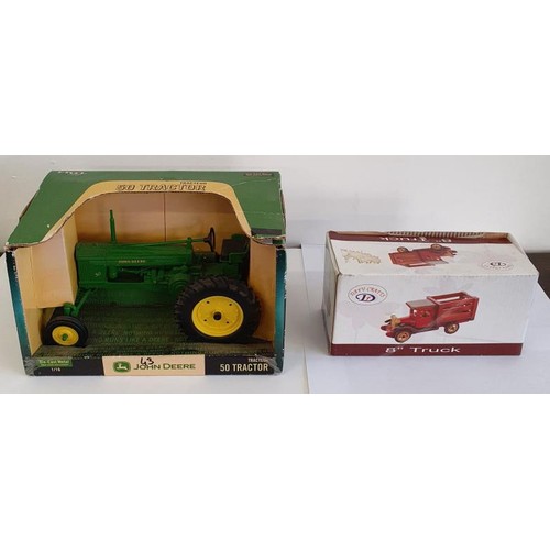 281 - 2 Vintage Toys in Presentation Boxes. (John Deere Tractor and 8