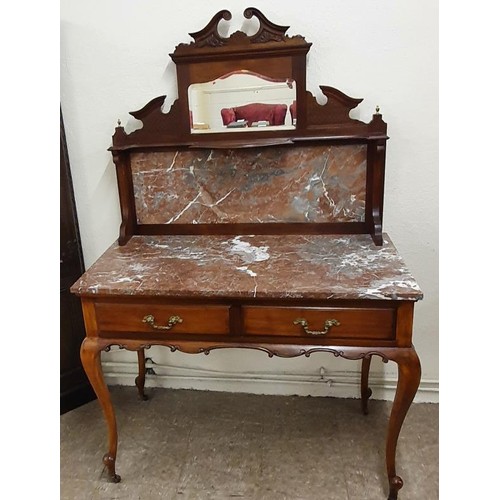 392 - Edwardian Mahogany And Marble Washstand, the carved op with bevelled mirror pane above a purple vein... 