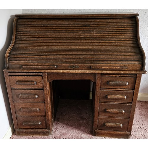 394 - Edwardian Oak Roll Top Desk, with the tambour front enclosing and arrangement of drawers and pigeon ... 