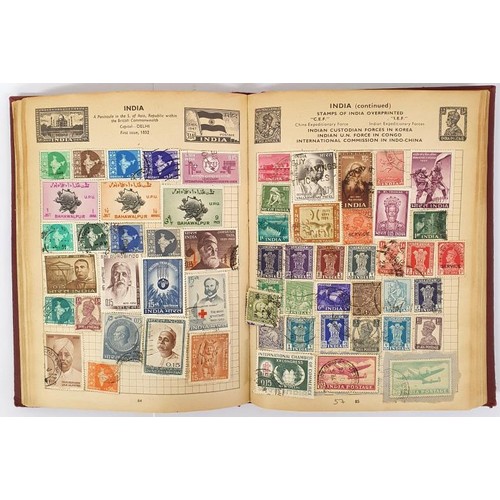 158 - Postage Stamp Album c1963, Stanley Gibbons, 4to, c2000 world wide stamps on approx. 150 pages all hi... 