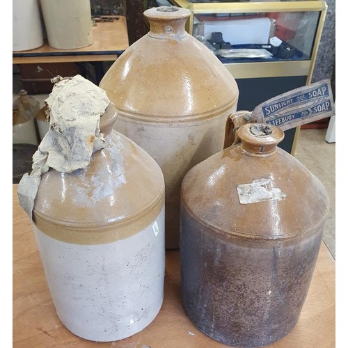 69 - One Gallon Stoneware Flagon with Sunlight Soap Label and two other plain examples (3)