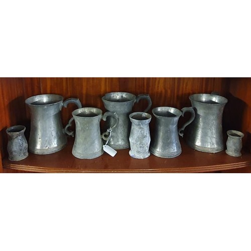 107 - Collection of Tankards - Quarts x 3, Pints x 2 and three various measures (8)