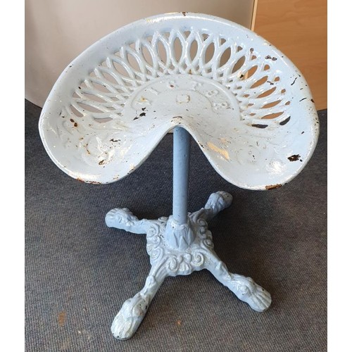 114 - Antique Victor Cast Iron Machine Seat High Stool with a decorative lions paw feet.