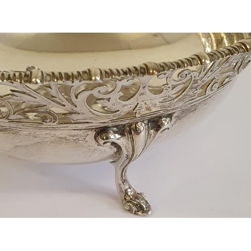 221 - Hallmarked Silver Fruit Bowl with highly decorative pierced border and raised on three pad feet. Hal... 