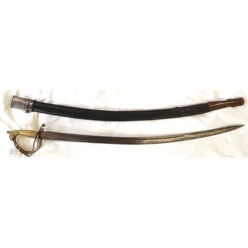 293 - Indian Cavalry Officer's Sword with engraved and curved blade and lion's mask grip