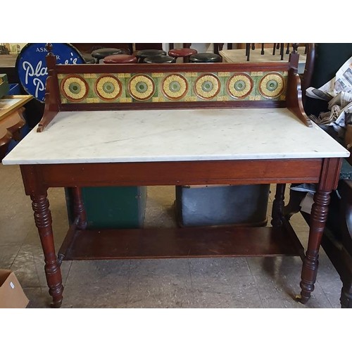 469 - Late Victorian Mahogany, Tiled and Marble Washstand. The spindle top, over a set of tiles, above a m... 