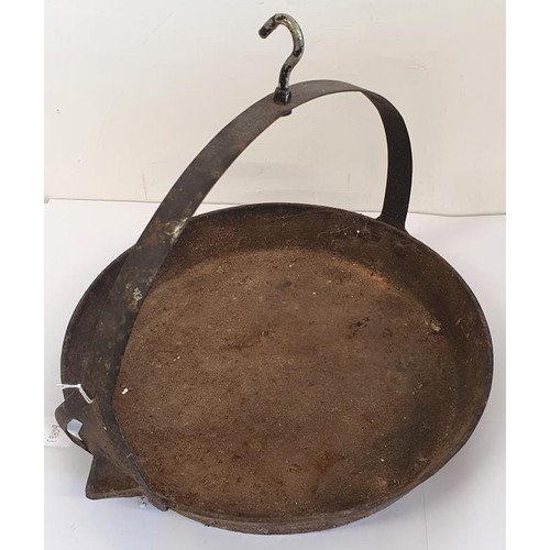 336 - An Antique Cast Iron Hanging Pan with pouring lip, c.15in diam