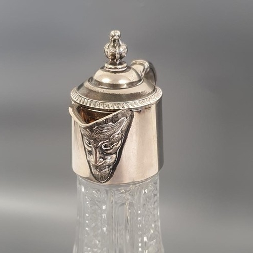 353 - Glass and Silver Plated Claret Jug with lion mask detail