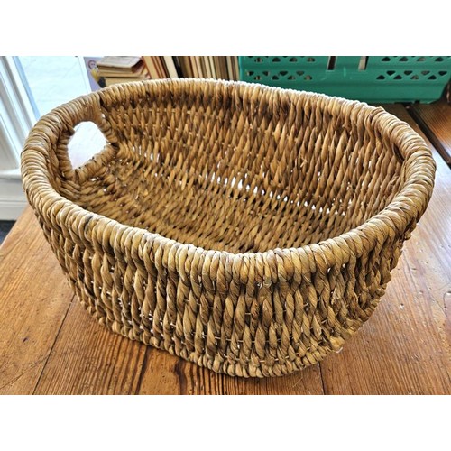 400 - Hand Woven Twin Handle Basket of large proportions, 20in long, 17in deep and 8.5in tall