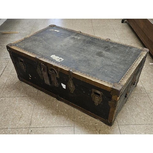 423 - Edwardian Steamer Trunk, metal bound and canvas covered, c.36in wide, 13in tall