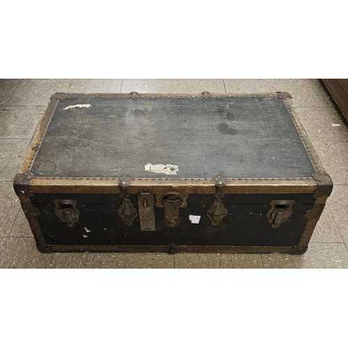 423 - Edwardian Steamer Trunk, metal bound and canvas covered, c.36in wide, 13in tall