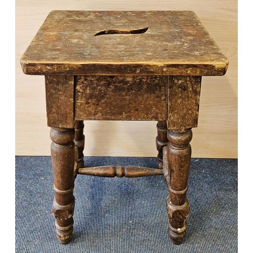 424 - Victorian Pitch Pine and Oak Frame Stool, the rectangular top with carry slot above four turned legs... 