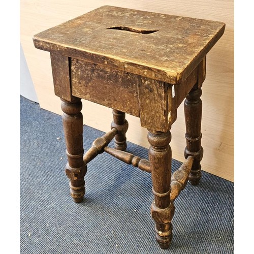 424 - Victorian Pitch Pine and Oak Frame Stool, the rectangular top with carry slot above four turned legs... 