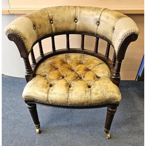 Very Fine Quality Antique Mahogany Library/Desk Chair, upholstered in good quality hide. The deep button top rail with carved panels, raised on turned supports above a deep button seat and raised on turned legs, brass toes and casters. c.1860-1880. c.30in wide, 30in tall and 29in tall. The top rail has had the end hide sections professionally replaced.