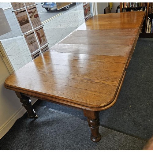 433 - Incredible Victorian Pitch Pine Extending Dining/Boardroom Table. The top with moulded edge above si... 