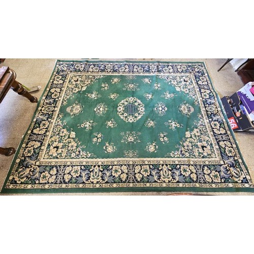 441 - Large Floral Pattern Floor Rug on a pale green ground