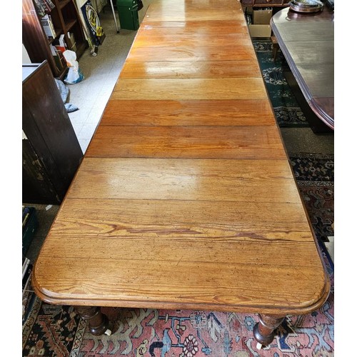 433 - Incredible Victorian Pitch Pine Extending Dining/Boardroom Table. The top with moulded edge above si... 