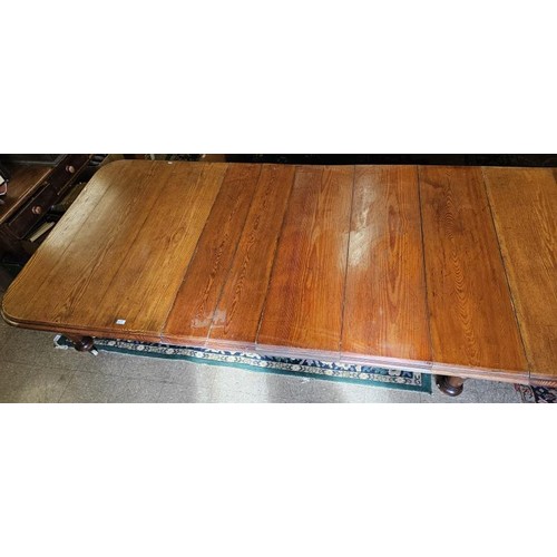 433 - Incredible Victorian Pitch Pine Extending Dining/Boardroom Table. The top with moulded edge above si... 