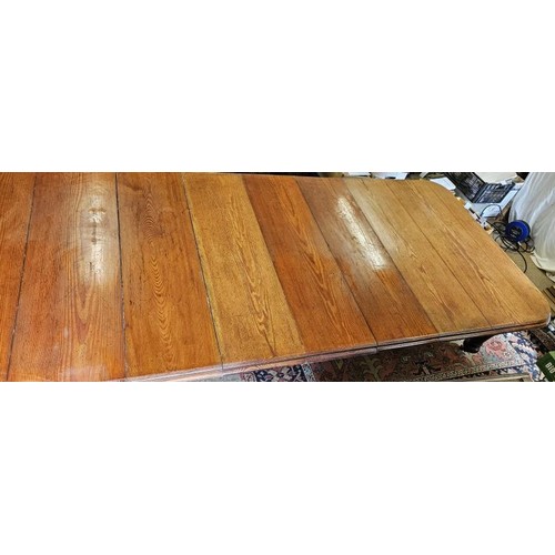 433 - Incredible Victorian Pitch Pine Extending Dining/Boardroom Table. The top with moulded edge above si... 